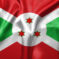 Burundi flag wave close up. Full page Burundi flying flag. Highly detailed realistic 3D rendering.